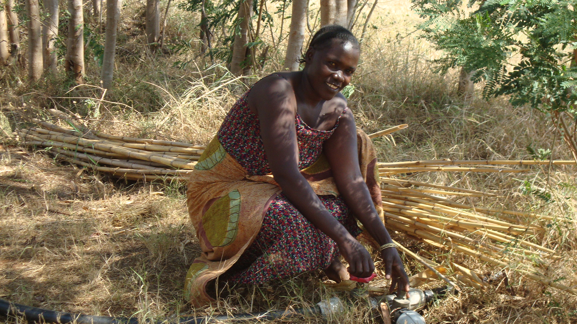 Working on an irrigation system at the tree nursery. © GRA